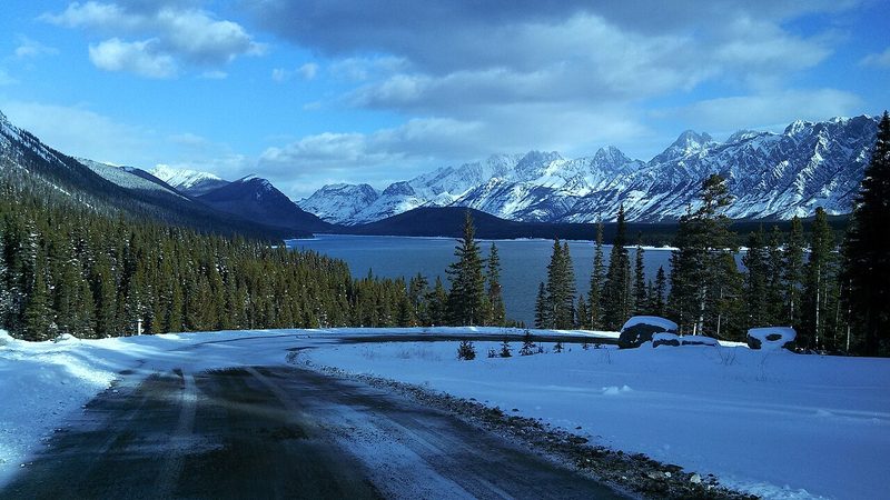 Snowy peaks above a lake in Peter Lougheed Provincial Park, Kananaskis